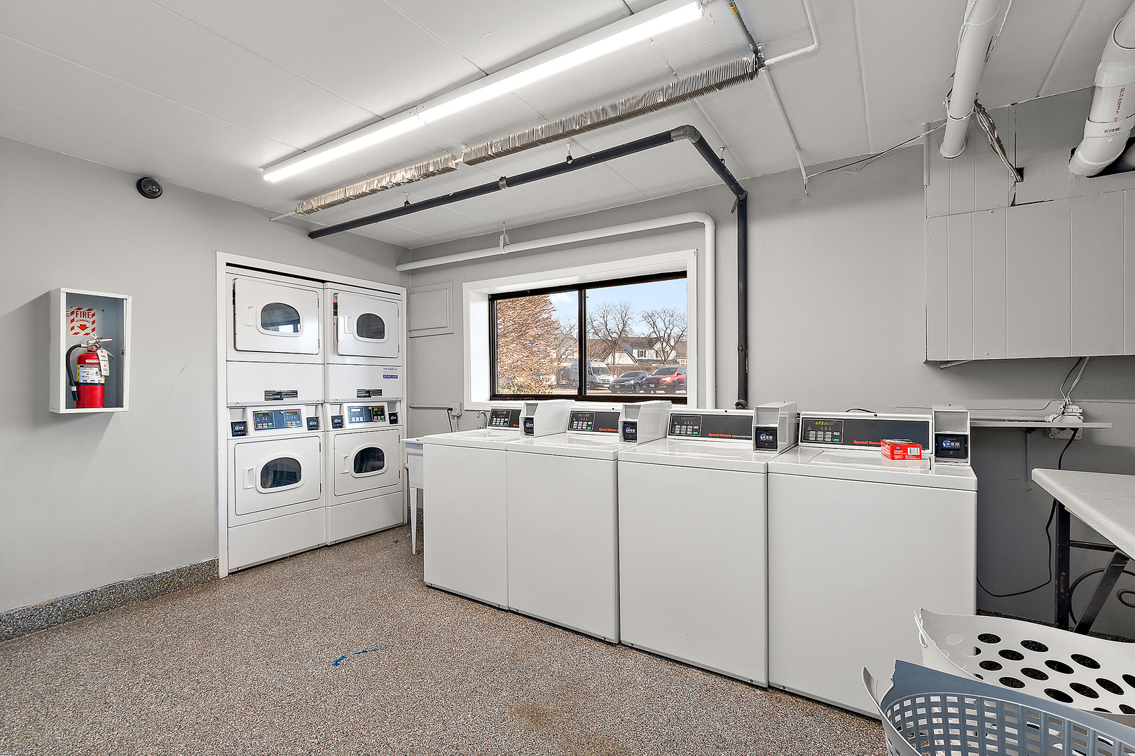 254 East Bailey Road, Unit M Naperville, IL 60565 - Photo 22 of 27 a white kitchen with sink and window