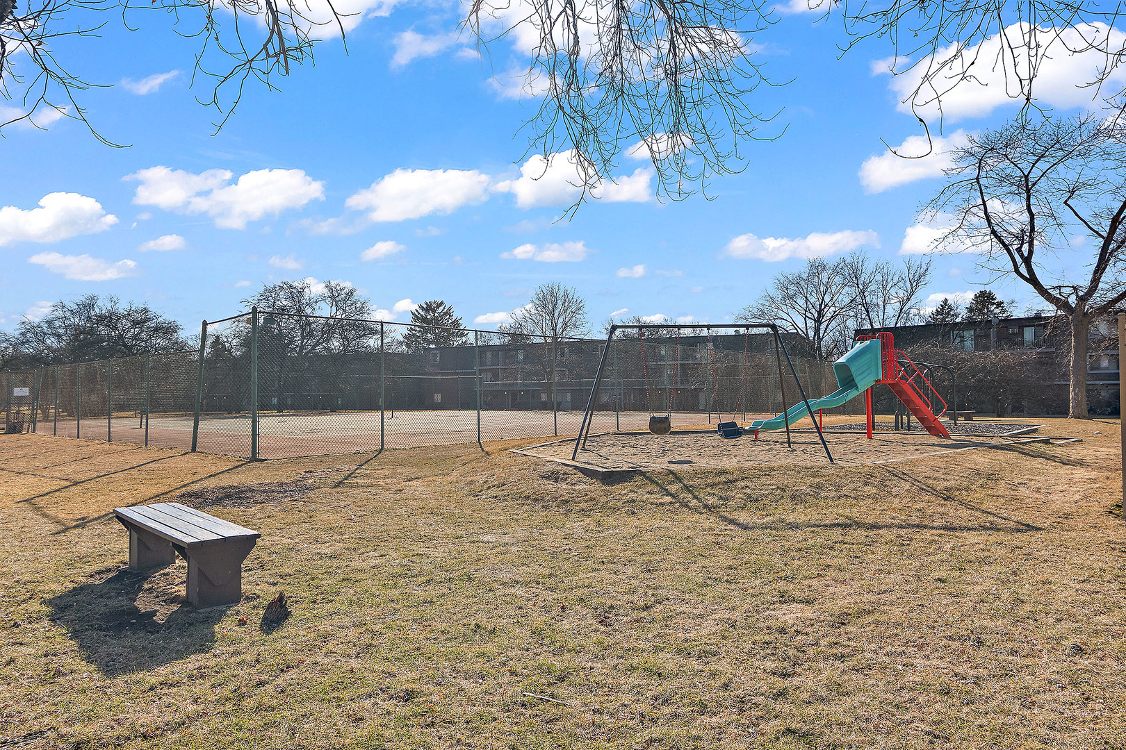 254 East Bailey Road, Unit M Naperville, IL 60565 - Photo 24 of 27 a view of a yard with a slide