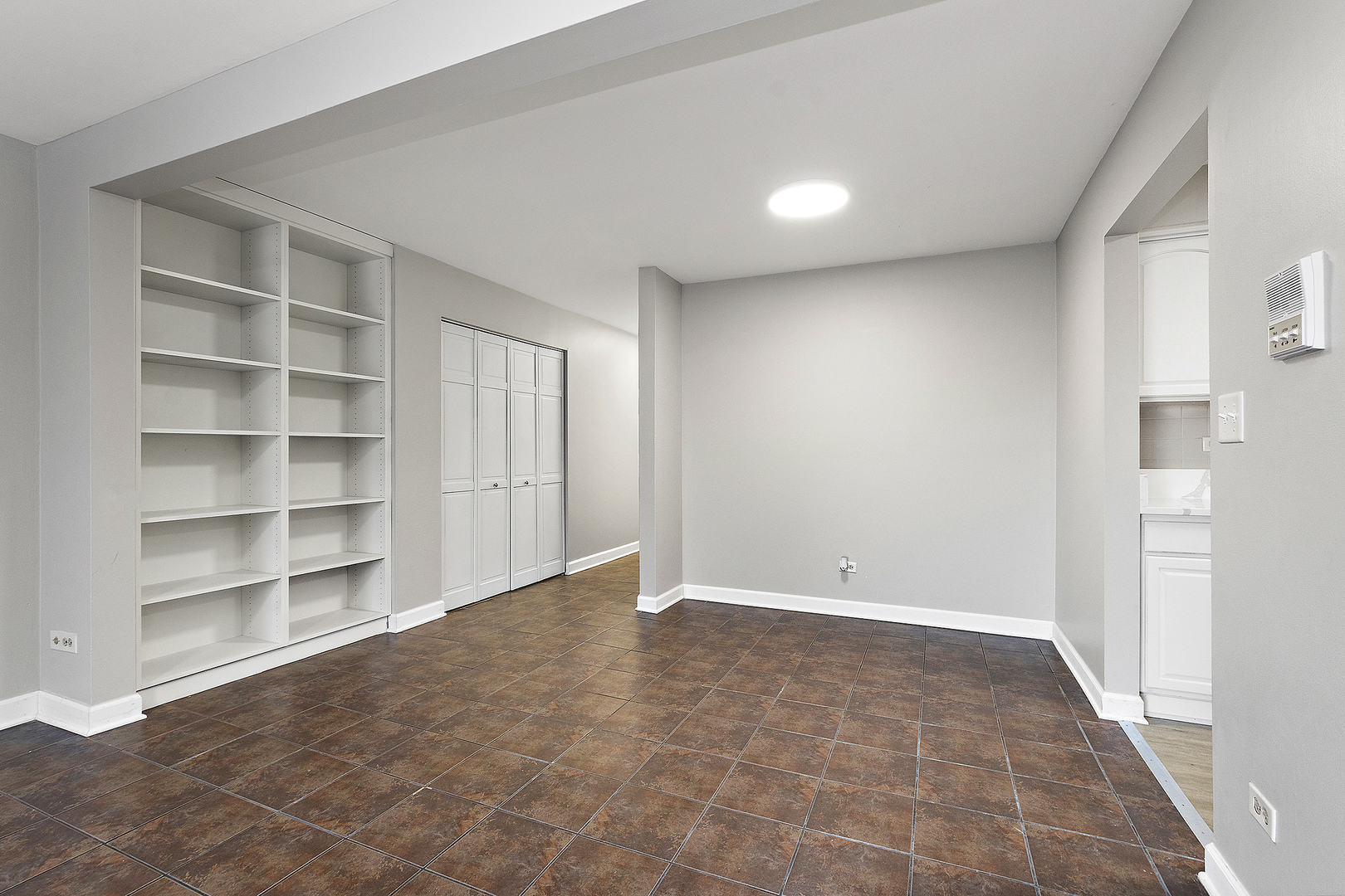 254 East Bailey Road, Unit M Naperville, IL 60565 - Photo 9 of 27 a view of an empty room with a window
