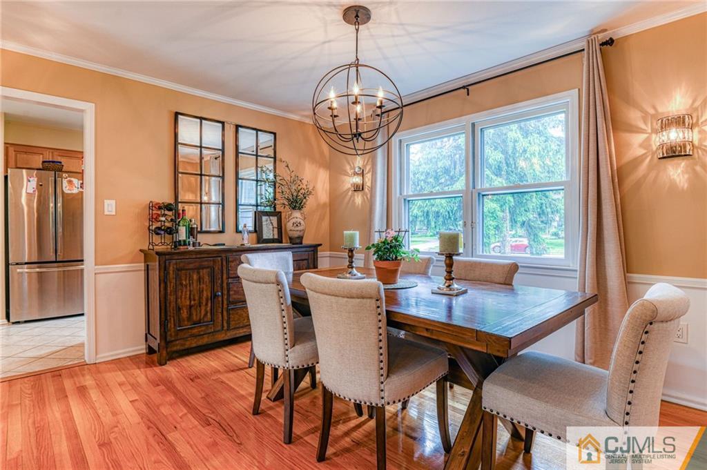 3 Spruce Lane Princeton, NJ 08540 - Photo 7 of 34 a dining room with furniture a chandelier and wooden floor