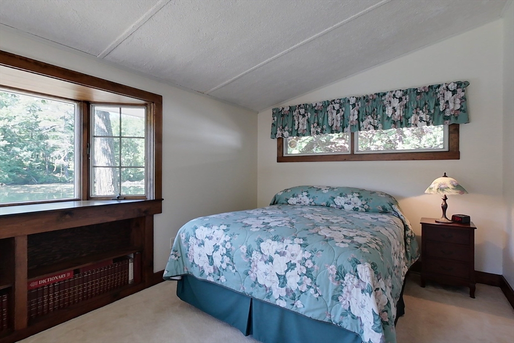 116 Shelters Road Groton, MA 01450 - Photo 14 of 41 a bedroom with a bed and a window