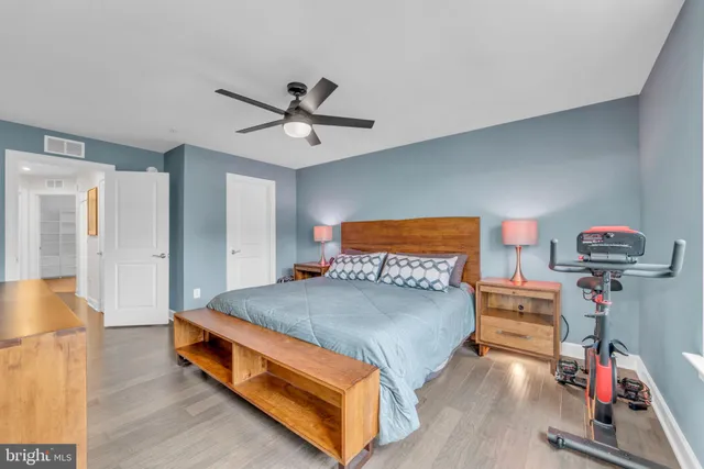 a view of an entryway with wooden floor