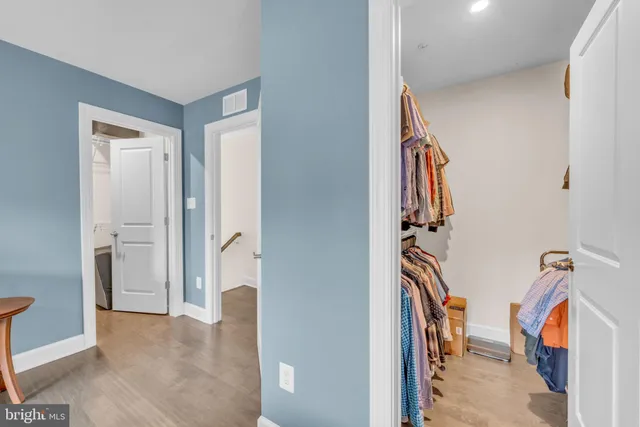 an empty room with a empty space and a ceiling fan