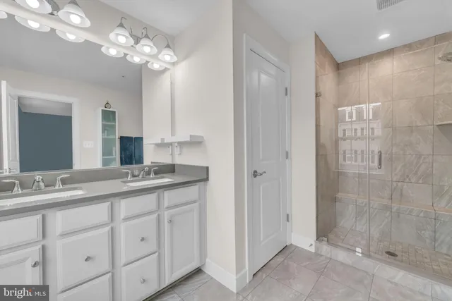 a room with gym equipment and a flat screen tv