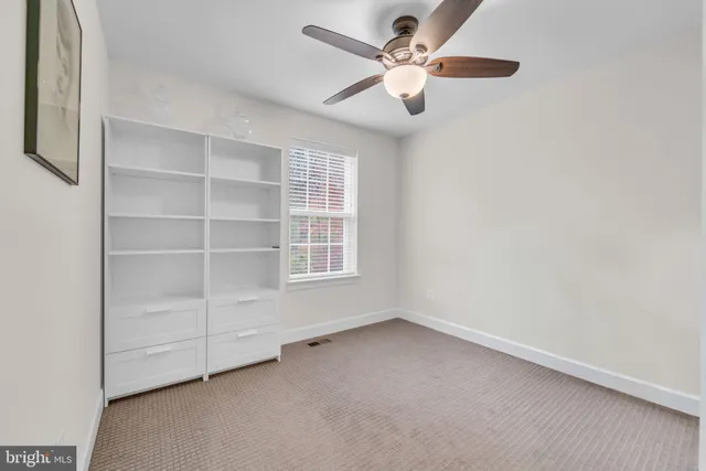a bathroom with a sink toilet vanity and tub