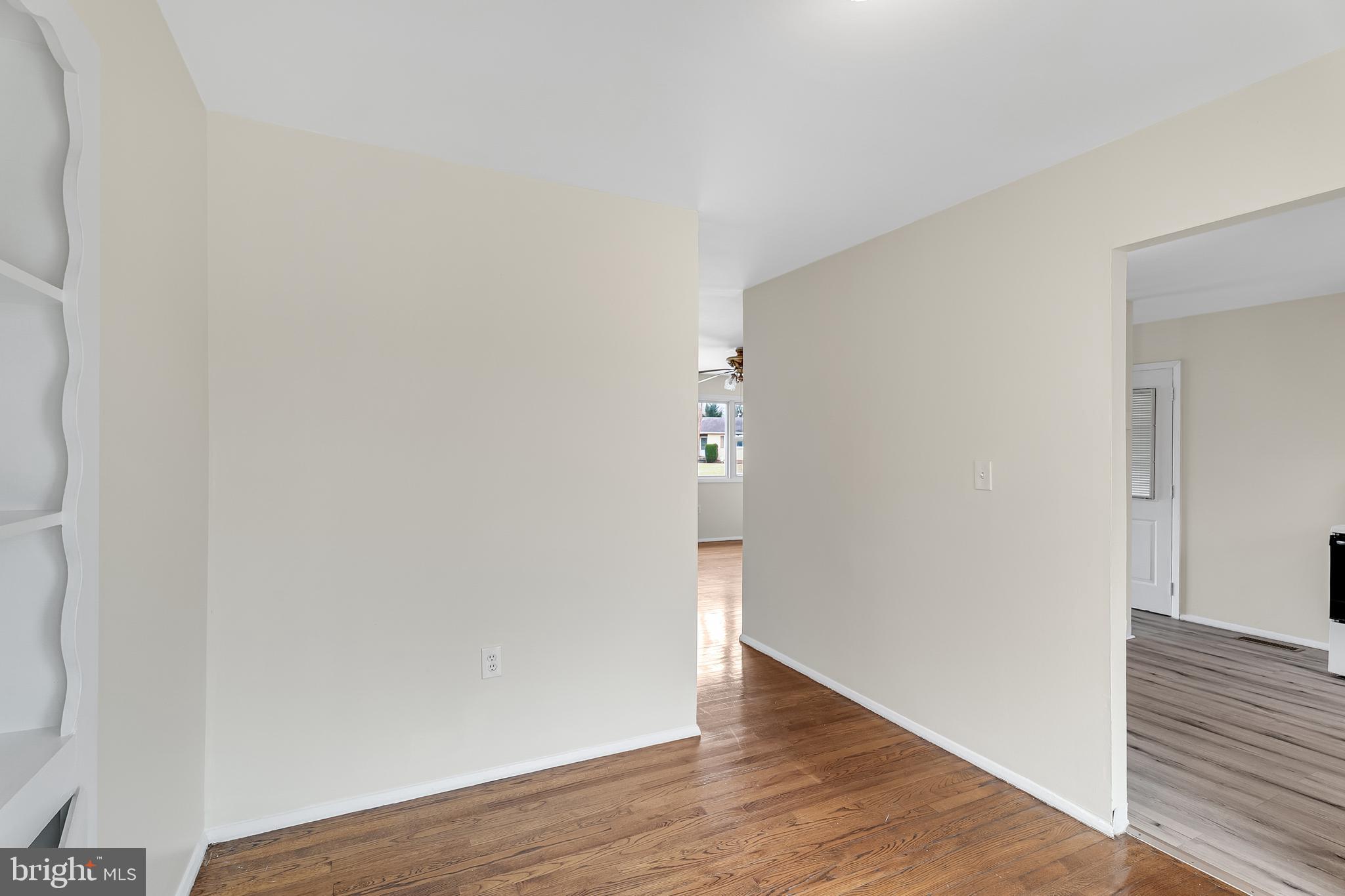 264 Old Line Avenue Laurel, MD 20724 - Photo 14 of 31 a view of an empty room with wooden floor