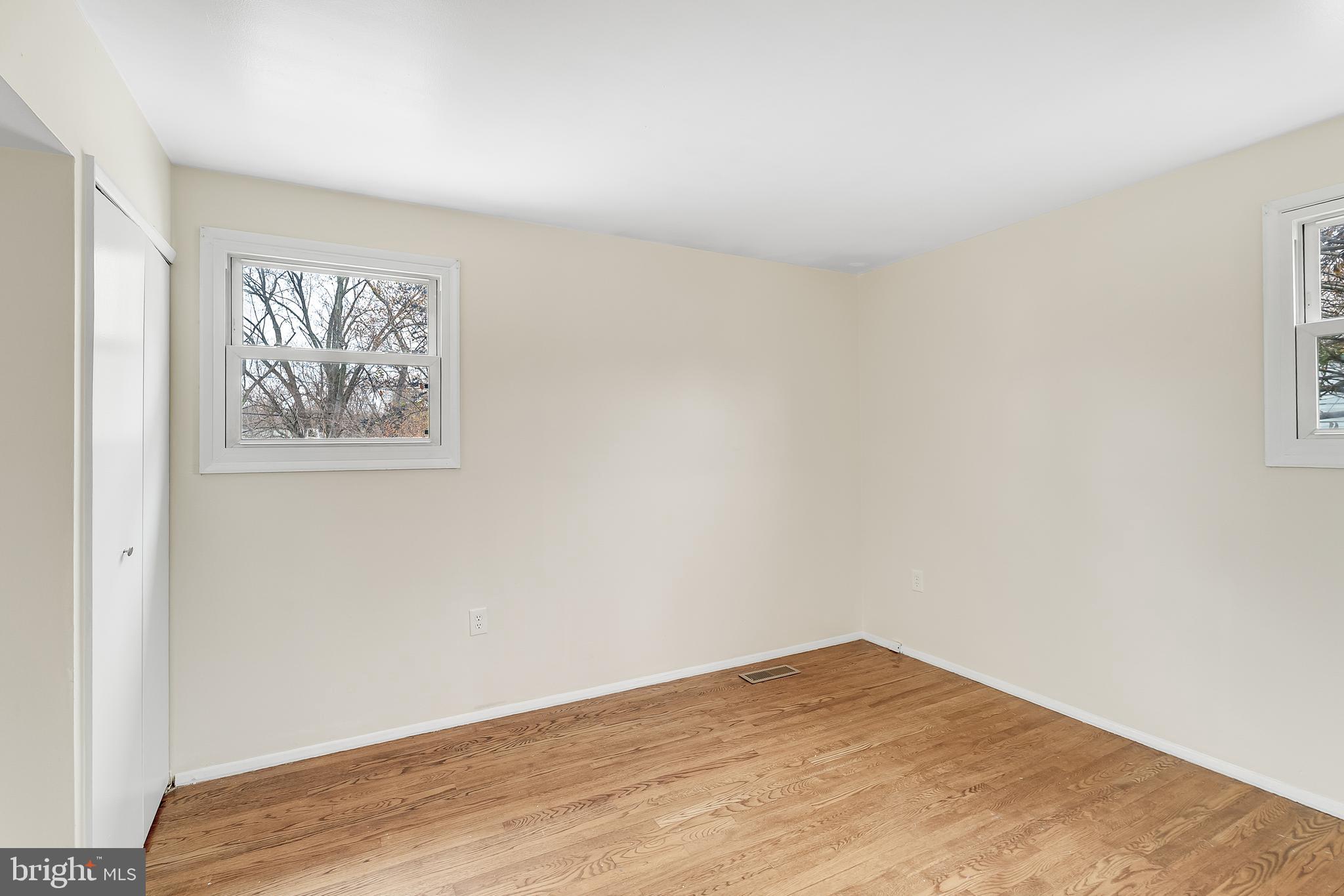 264 Old Line Avenue Laurel, MD 20724 - Photo 17 of 31 a view of an empty room with wooden floor