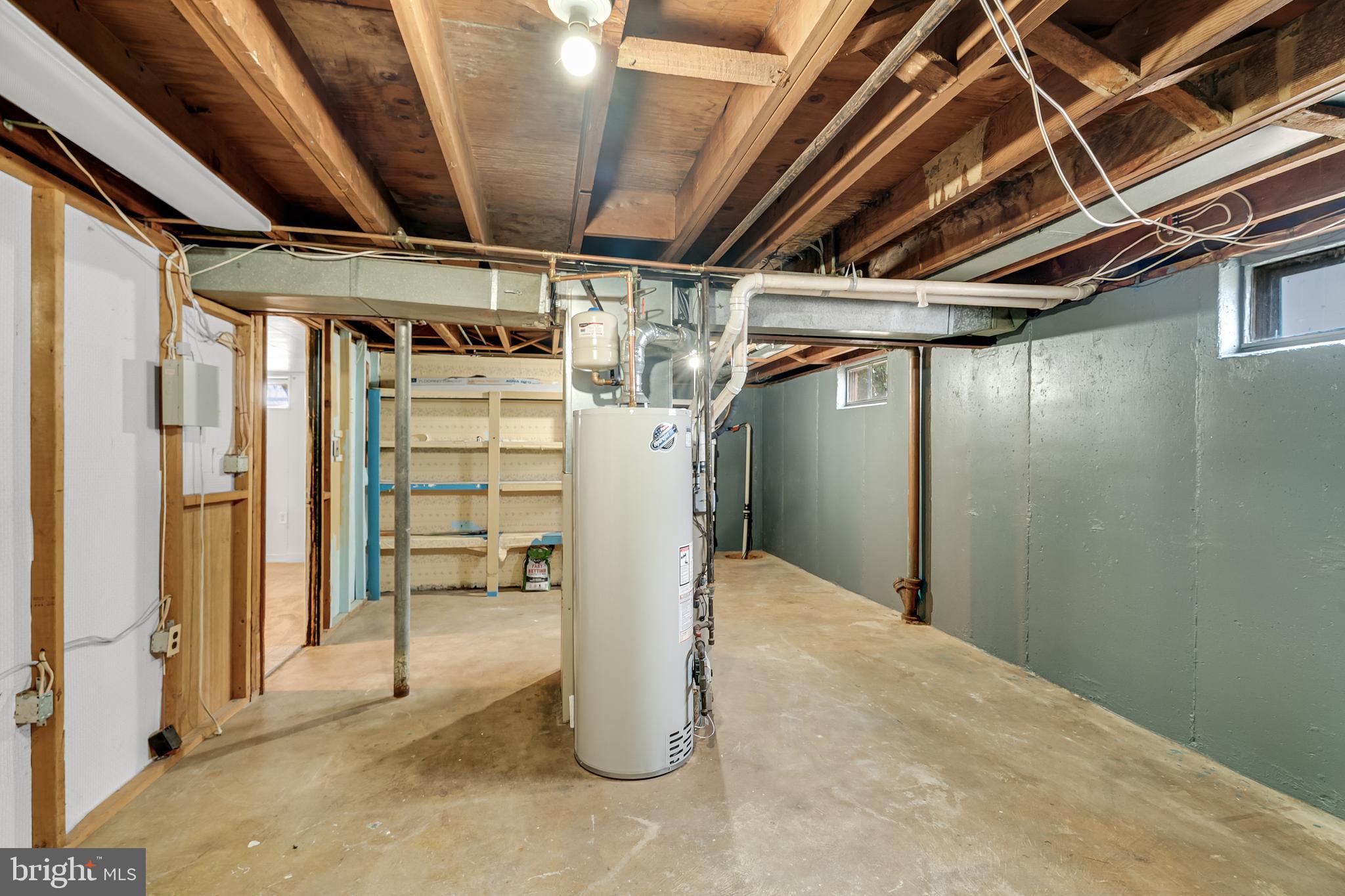 264 Old Line Avenue Laurel, MD 20724 - Photo 25 of 31 a view of water heater room with wooden ceiling