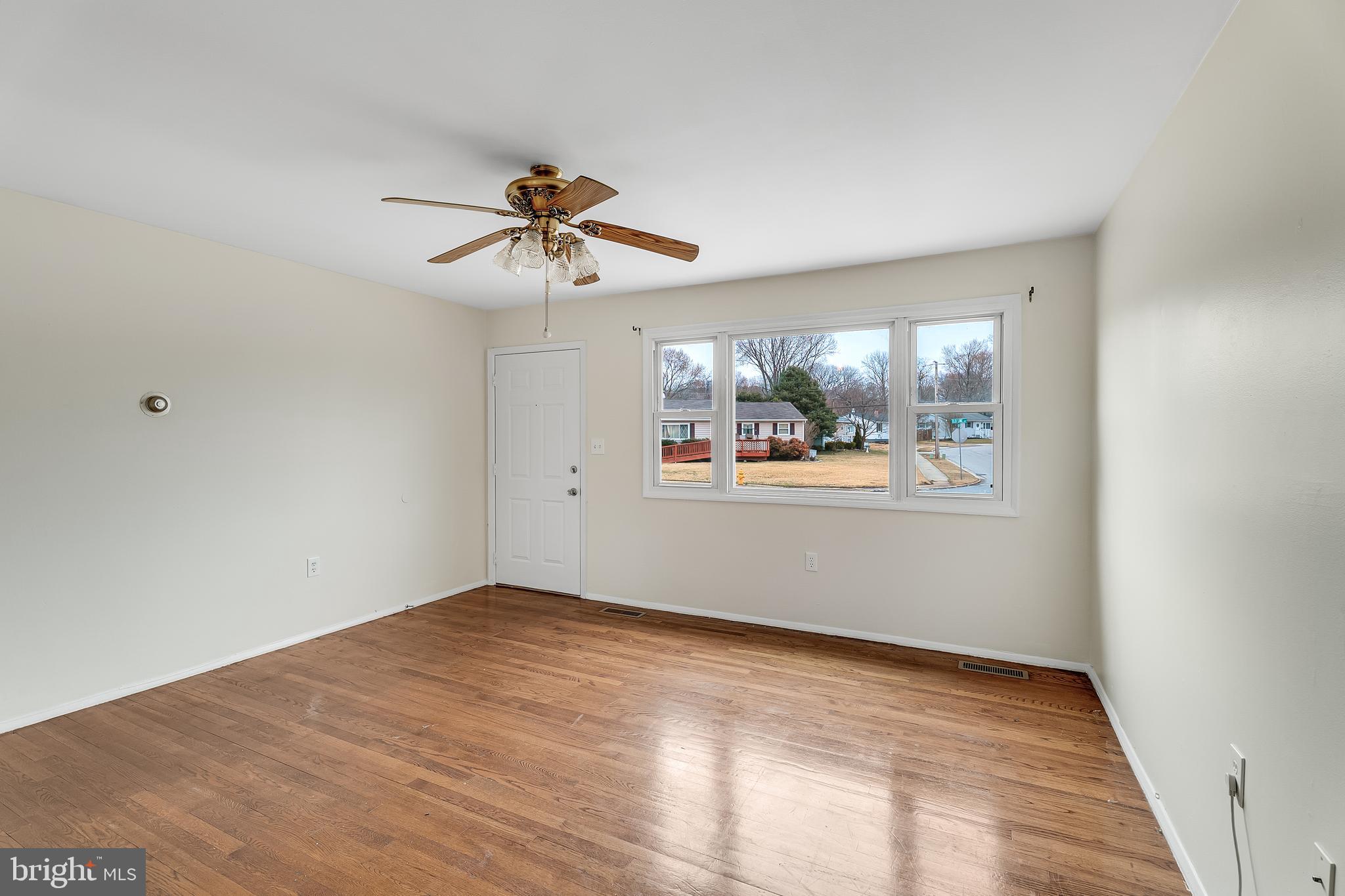 264 Old Line Avenue Laurel, MD 20724 - Photo 5 of 31 a view of empty room with wooden floor