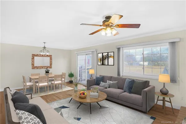 a living room with furniture and a window