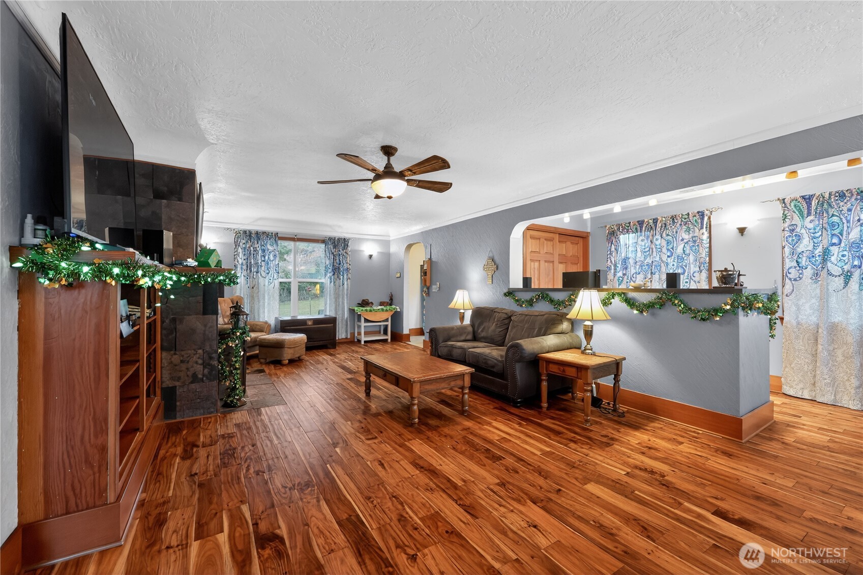 1533 Northcliff Road Shelton, WA 98584 - Photo 6 of 37 a living room with furniture and a wooden floor
