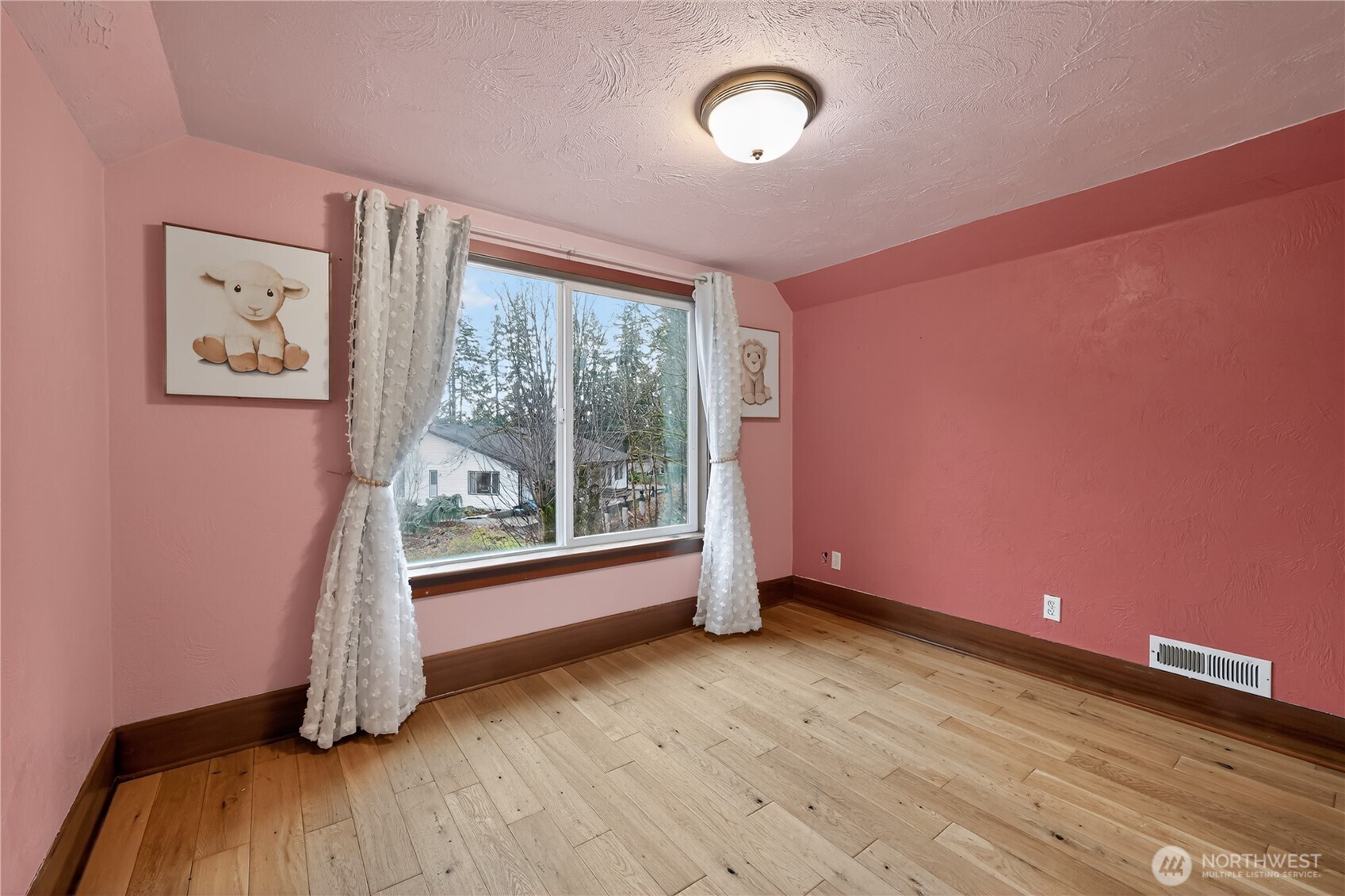1533 Northcliff Road Shelton, WA 98584 - Photo 8 of 37 an empty room with wooden floor and windows