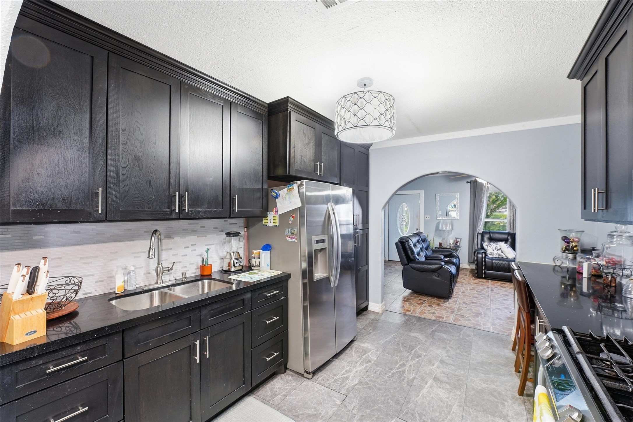 811 Canadian Street Houston, TX 77009 - Photo 12 of 26 flows nicely to formal dining.