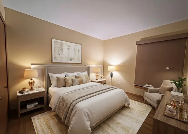 a bedroom with a bed and a couch