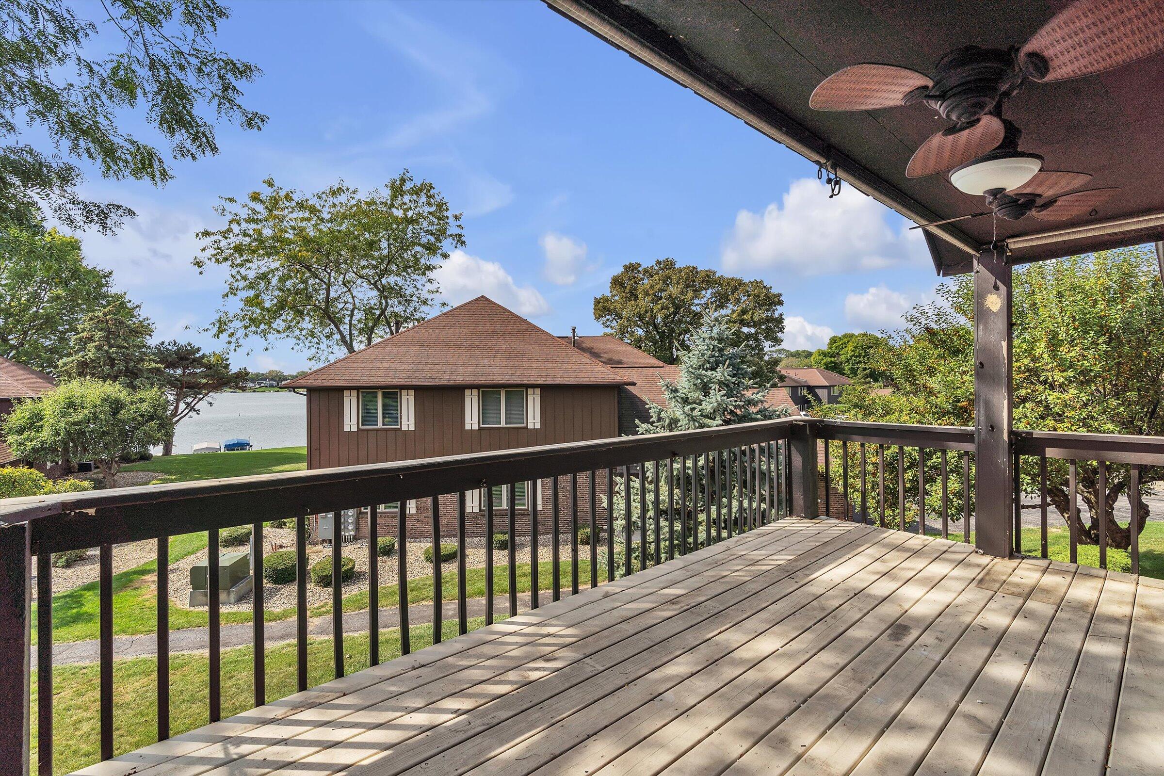 2521 East Lakeshore Drive Crown Point, IN 46307 - Photo 22 of 31 a balcony with wooden floor