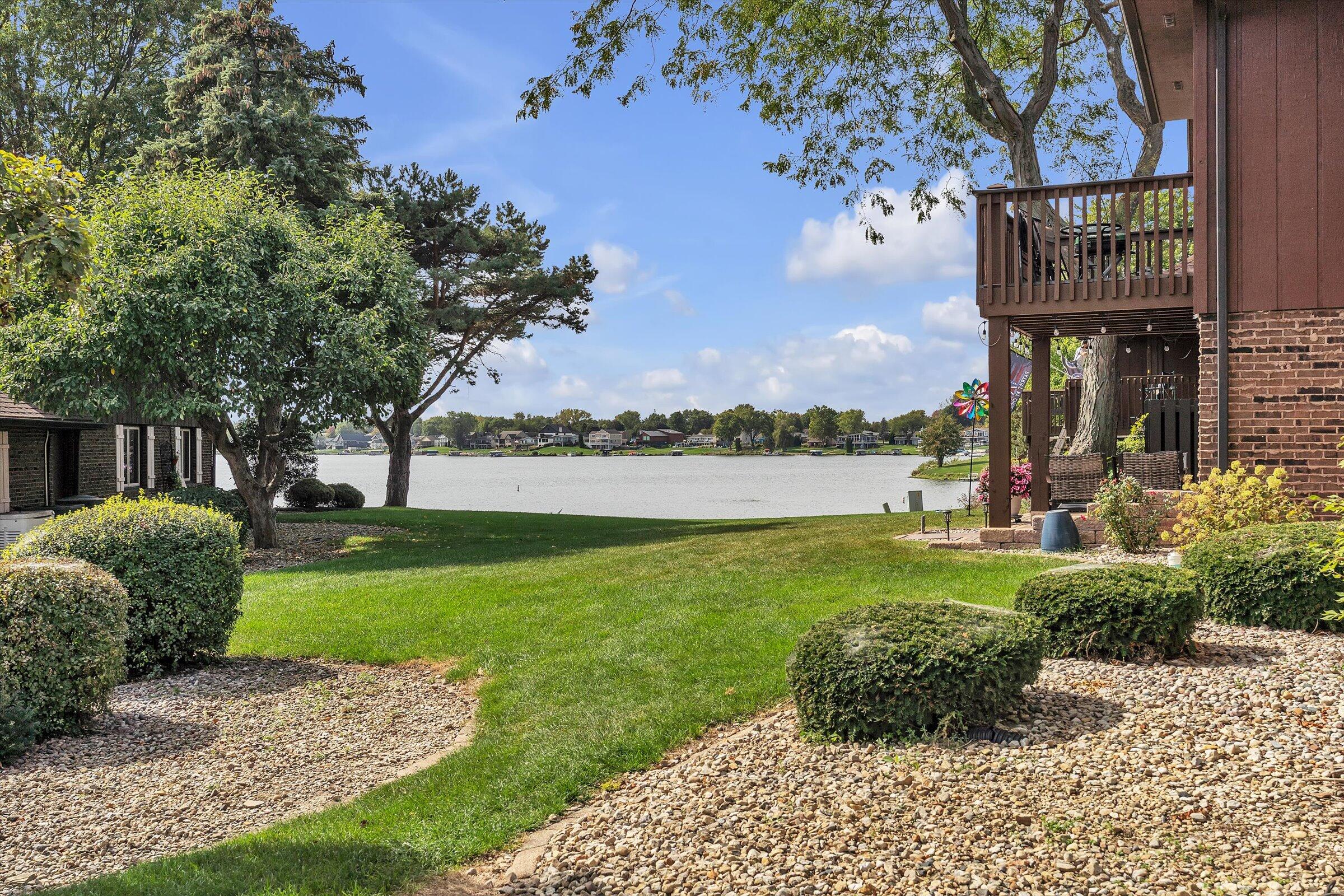 2521 East Lakeshore Drive Crown Point, IN 46307 - Photo 24 of 31 a front view of a house with garden