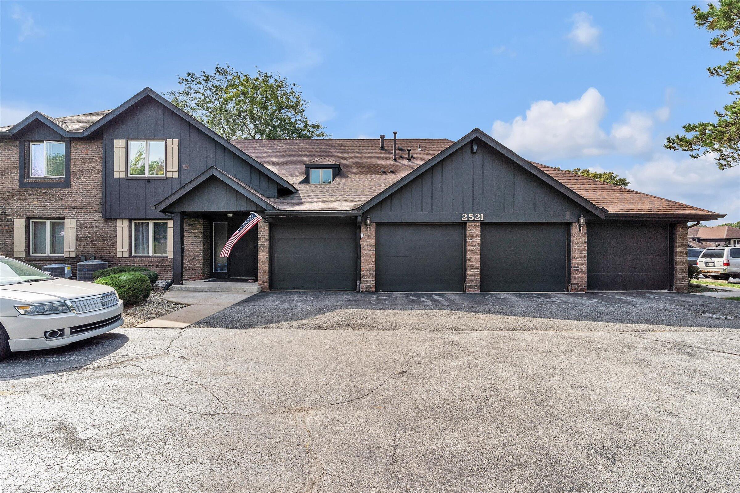 2521 East Lakeshore Drive Crown Point, IN 46307 - Photo 3 of 31 a house with a outdoor space