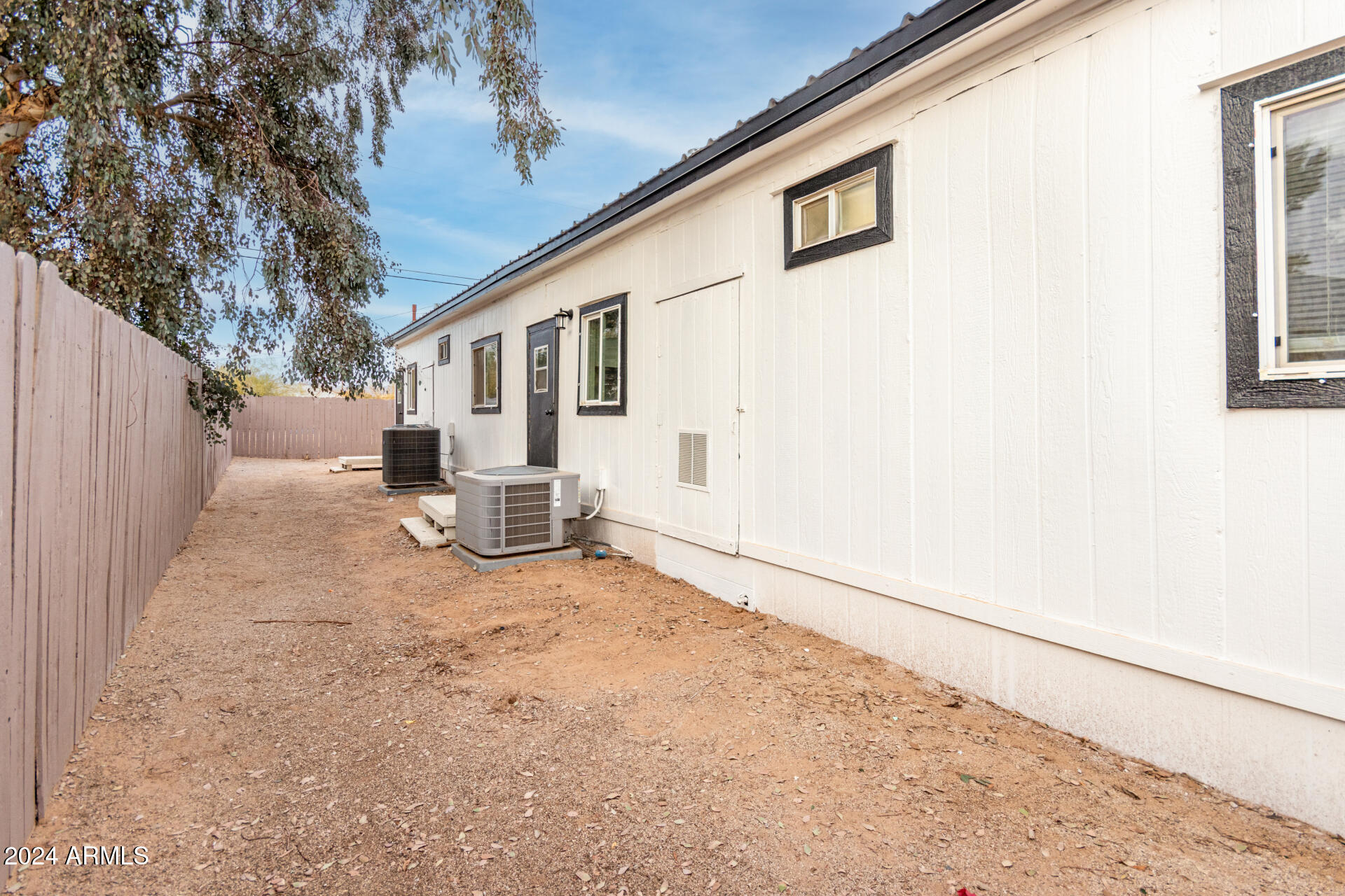 204 East Baseline Road Buckeye, AZ 85326 - Photo 25 of 29 a view of a house with a snow in the yard
