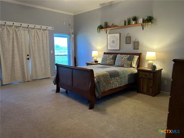 a bathroom with a sink toilet and a mirror