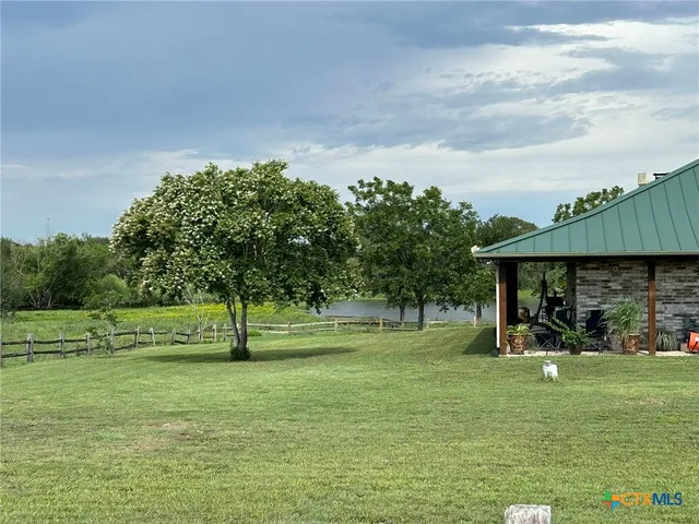 a view of a lake with outdoor space