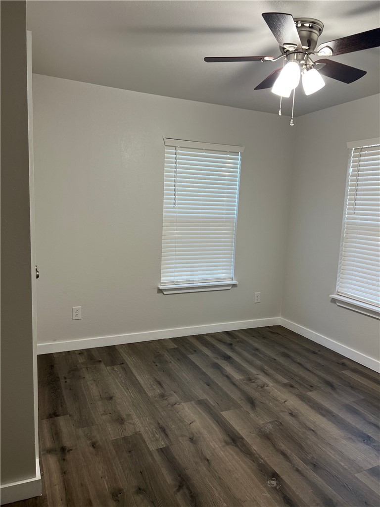 912 North Rife Street Aransas Pass, TX 78336 - Photo 20 of 23 an empty room with a window and a fan