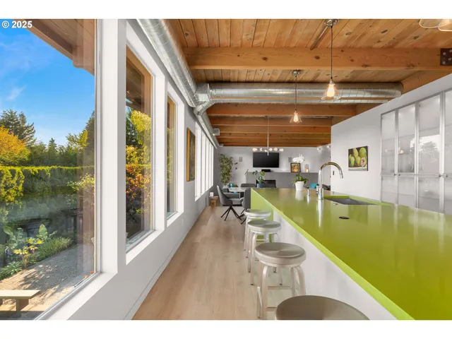 a view of a swimming pool with a balcony