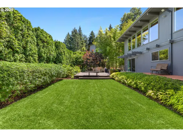 a view of a house with a back yard