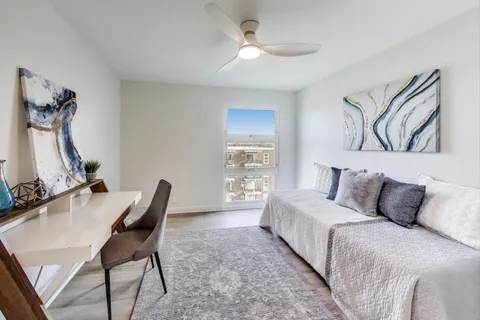 a bedroom with furniture and a bed