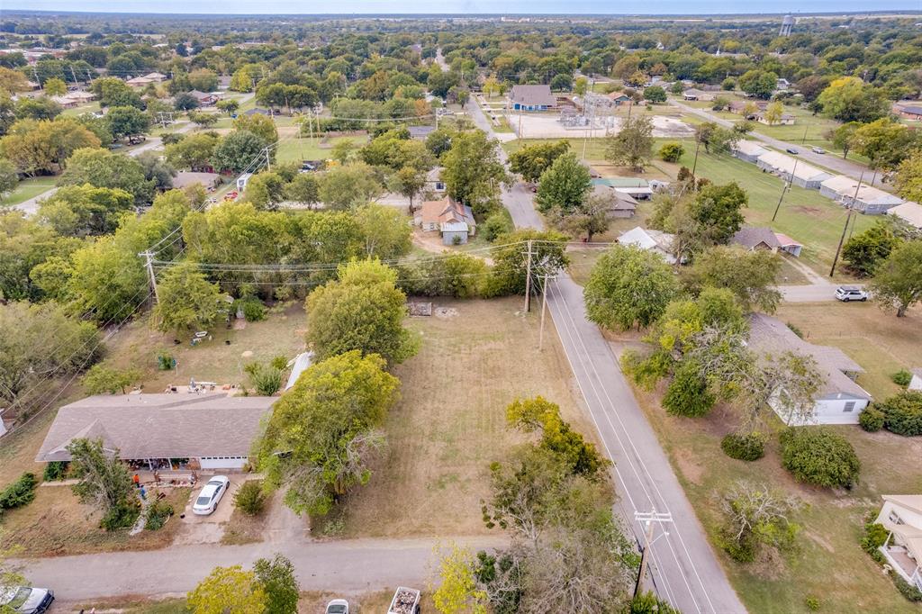 511 East Houston Street Leonard, TX 75452 - Photo 3 of 5 an aerial view of residential houses with outdoor space