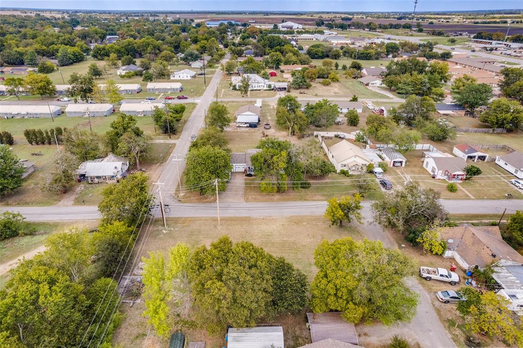 511 East Houston Street Leonard, TX 75452 - Photo 4 of 5 an aerial view of residential houses with outdoor space