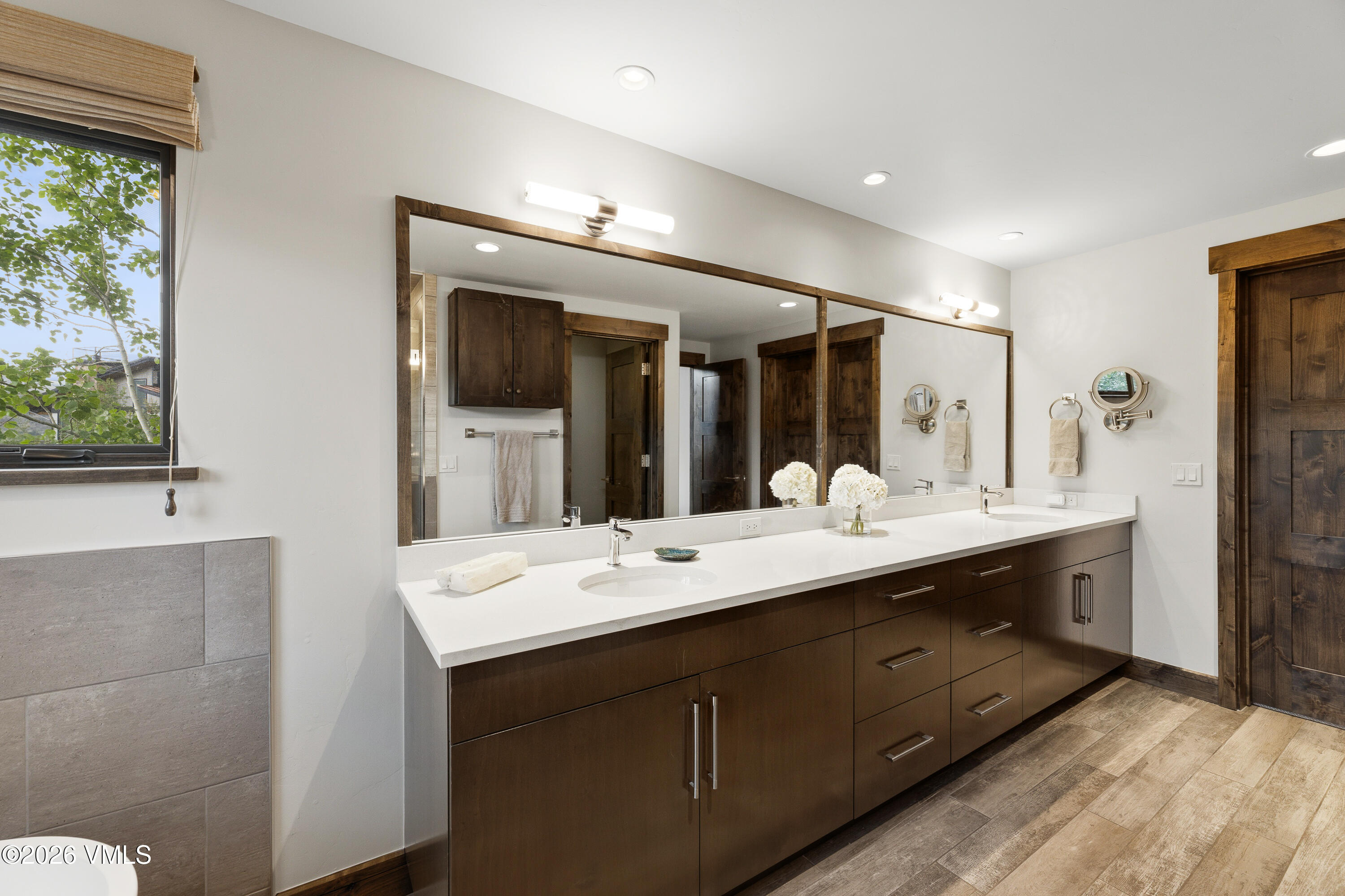 91 Edwards Pointe Edwards, CO 81632 - Photo 18 of 39 a bathroom with a double vanity sink mirror and double
