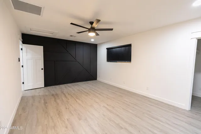 a view of a livingroom with a flat screen tv