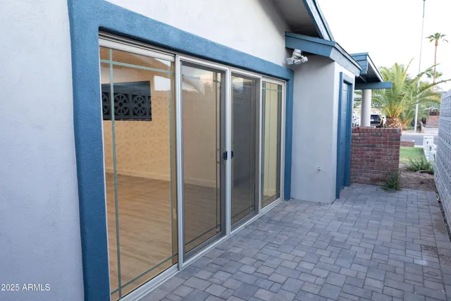 a view of a porch with a door