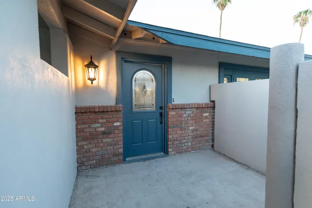 a view of an empty room and hallway