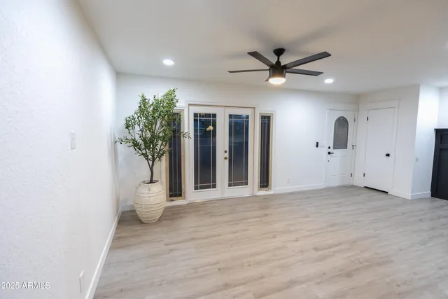 a view of a livingroom with a potted plant