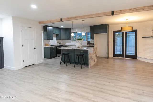 a view of a kitchen and dining room