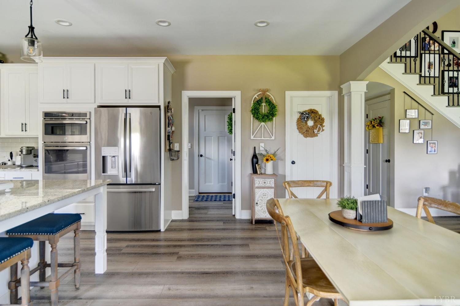 2667 Bellevue Road Forest, VA 24551 - Photo 23 of 55 a kitchen with stainless steel appliances granite countertop a refrigerator and a stove top oven