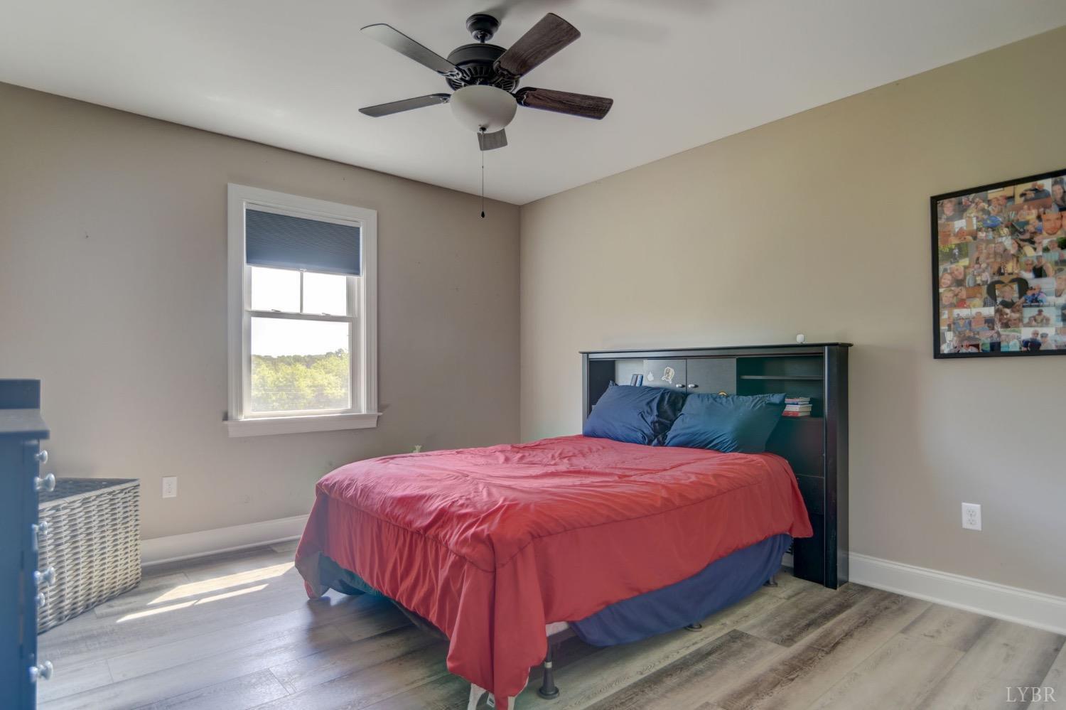 2667 Bellevue Road Forest, VA 24551 - Photo 32 of 55 a bedroom with a bed and a window