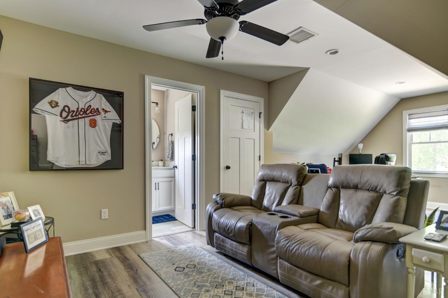 2667 Bellevue Road Forest, VA 24551 - Photo 37 of 55 a living room with furniture and a wooden floor