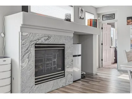 a living room with a fireplace