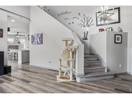 a view of entryway with wooden floor