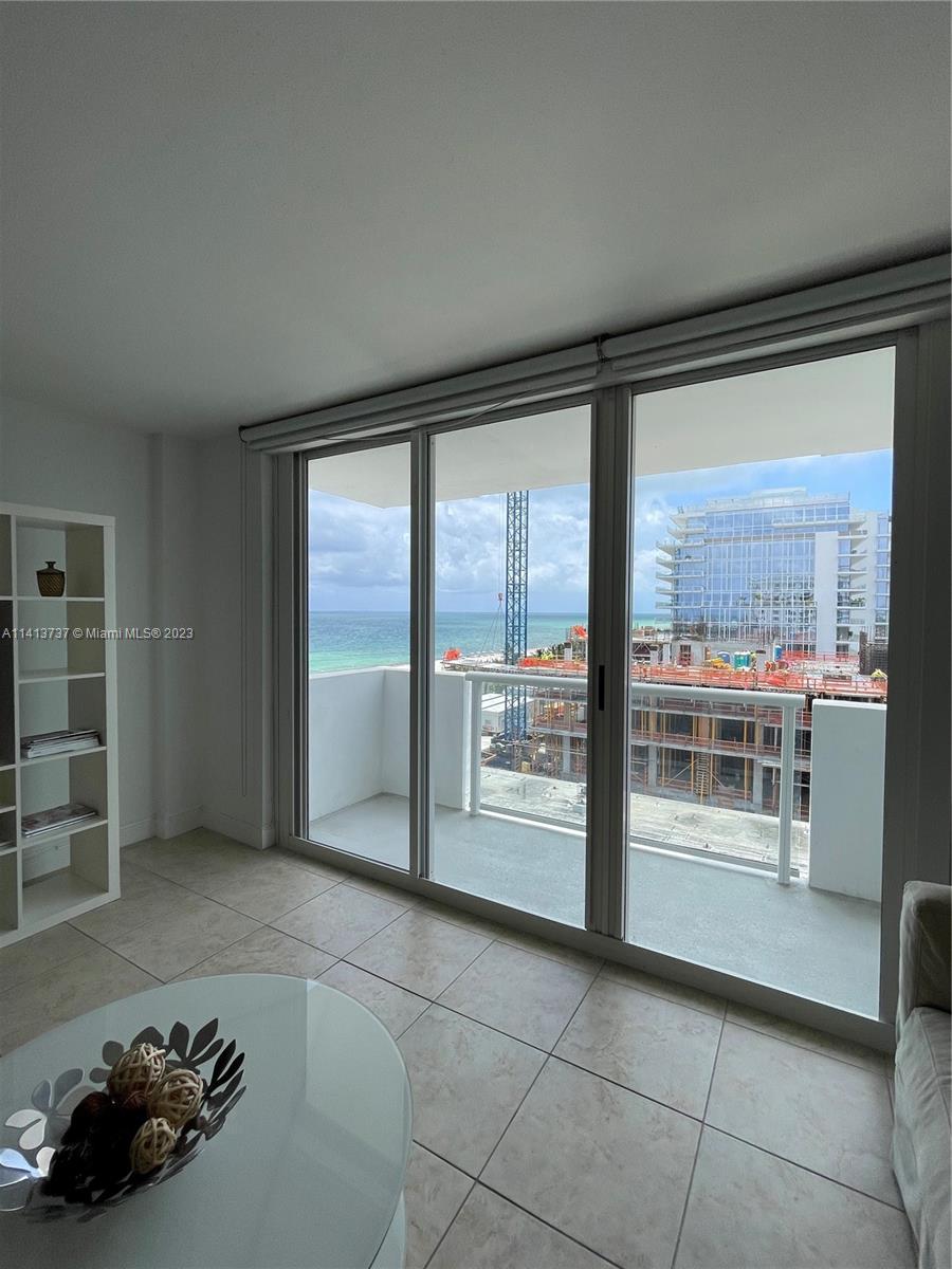 Surfside Surfside, FL 33154 - Photo 23 of 27 a room with furniture and large windows