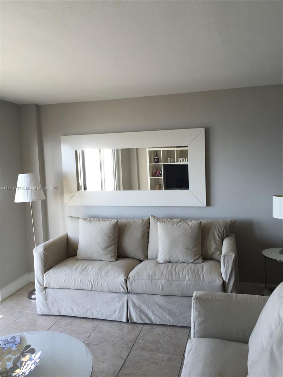 Surfside Surfside, FL 33154 - Photo 9 of 27 a living room with furniture and a window