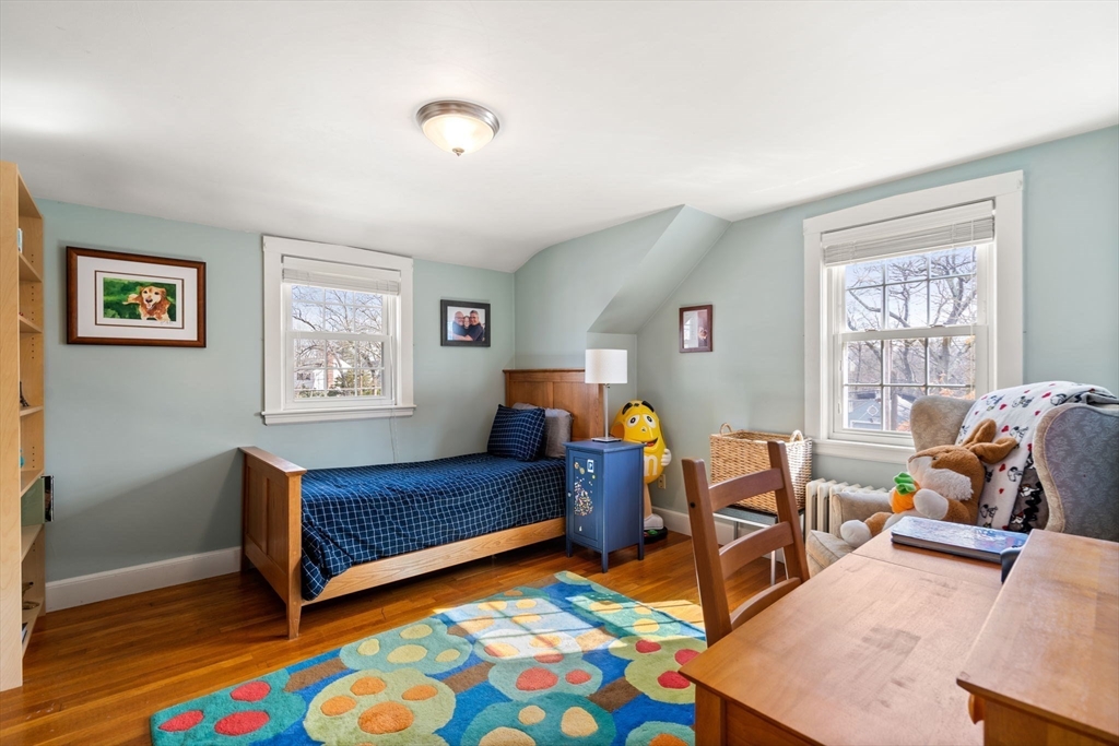 23 Hemlock Road Newton, MA 02464 - Photo 23 of 42 a living room with furniture and a window