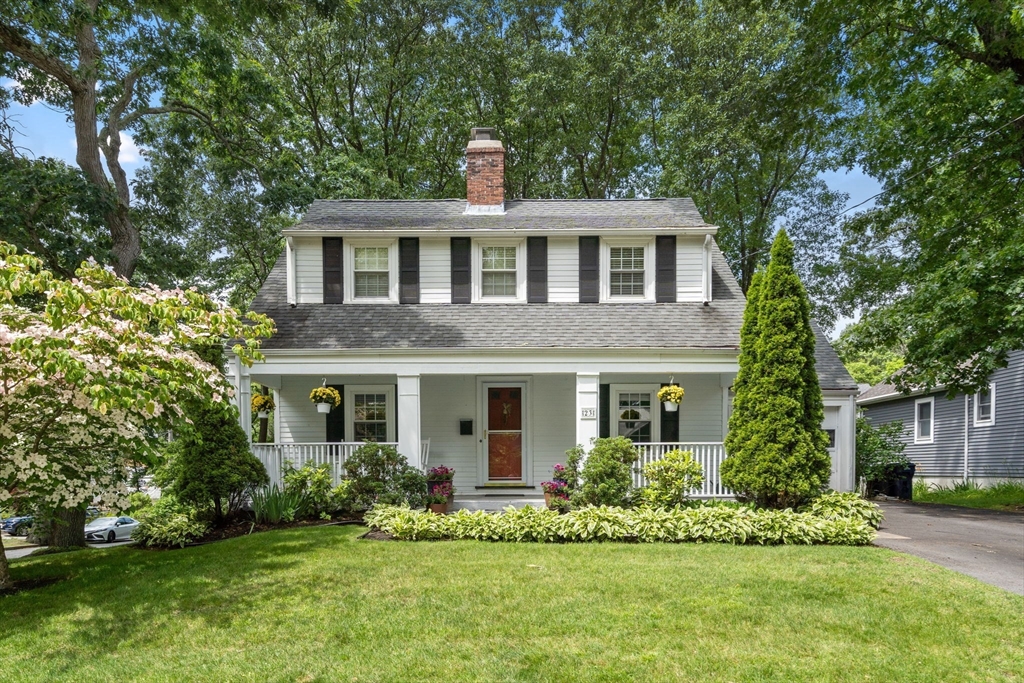 23 Hemlock Road Newton, MA 02464 - Photo 28 of 42 a front view of a house with a yard