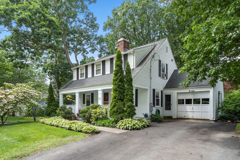 23 Hemlock Road Newton, MA 02464 - Photo 33 of 42 a front view of a house with a garden