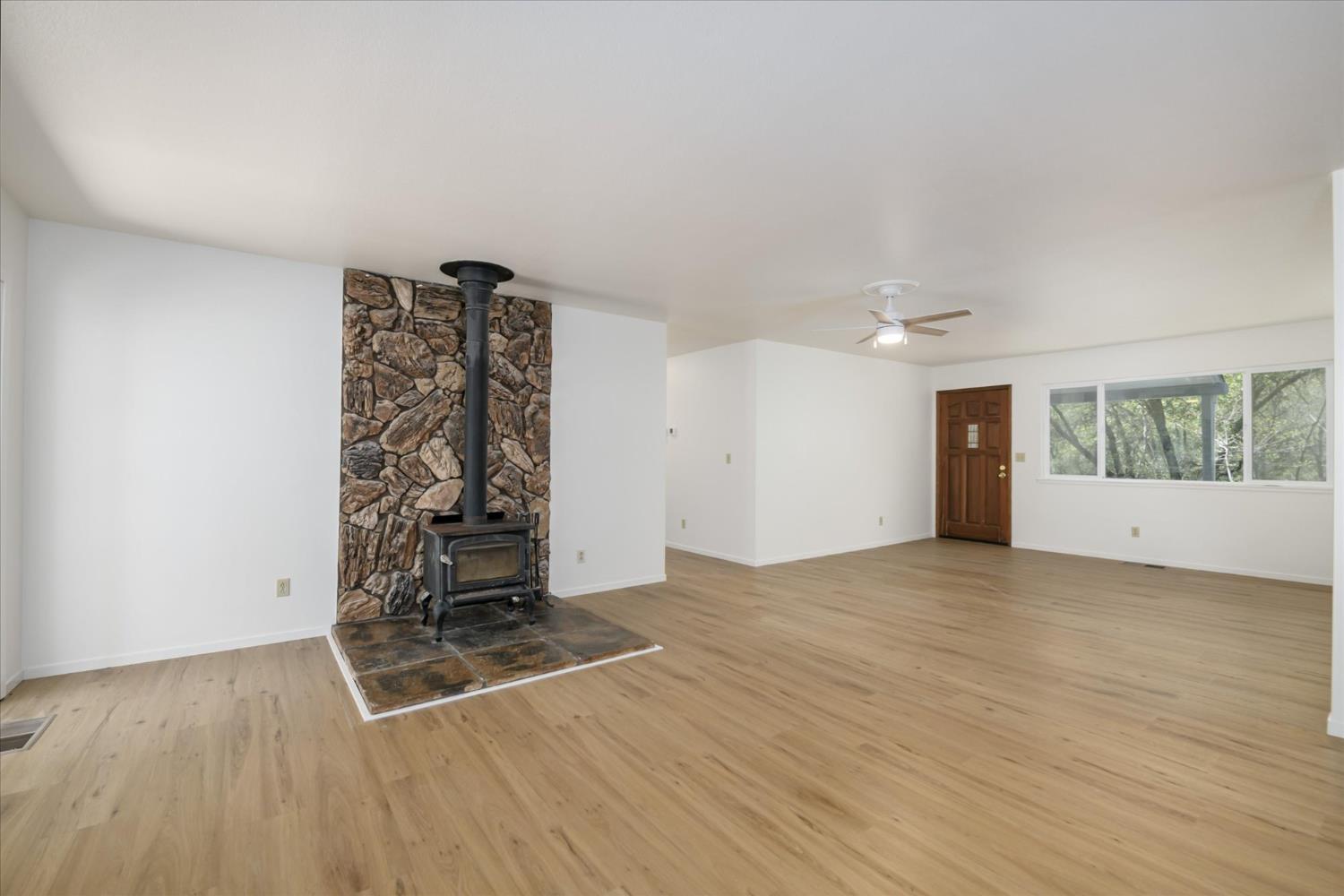 4910 Chisholm Trail Placerville, CA 95667 - Photo 5 of 41 wooden floor in an empty room with a window