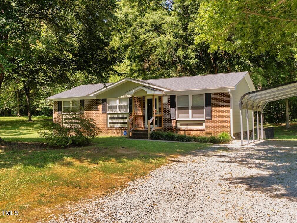 1310 Blacksmith Road Efland, NC 27243 - Photo 1 of 31 Bright front