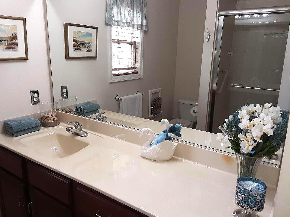 1020 Hummingbird Lane Spring Hill, TN 37174 - Photo 16 of 30 Secondary Bath Has Beautiful Shower Upgrade, Raised Vanities.