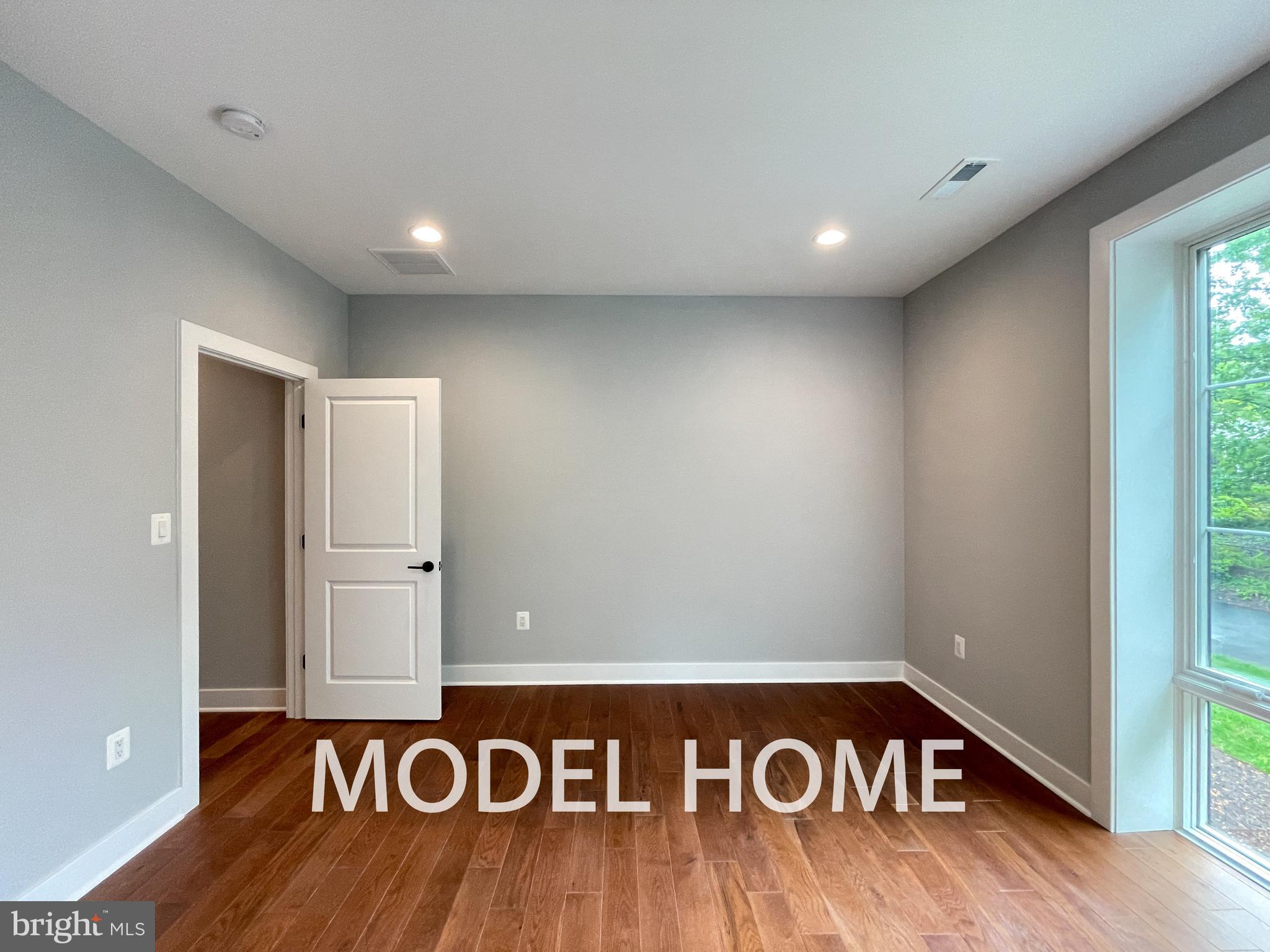 536 Walker Street Southwest Vienna, VA 22180 - Photo 43 of 57 a view of a hallway with wooden floor